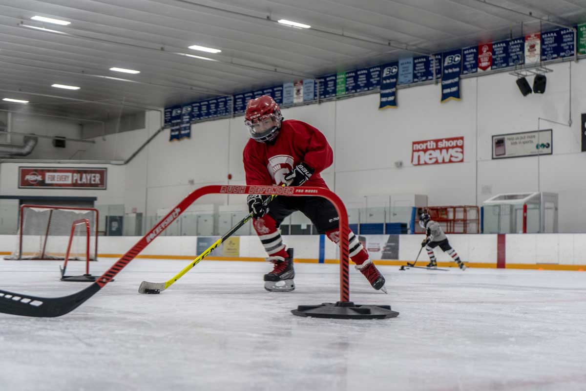 Spartans player working through a skating drill